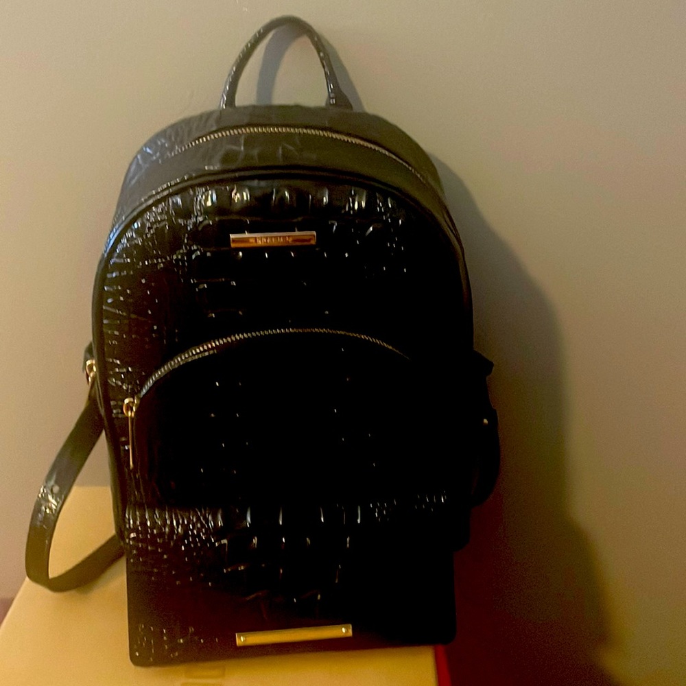 Brahmin back pack with wallet to match.